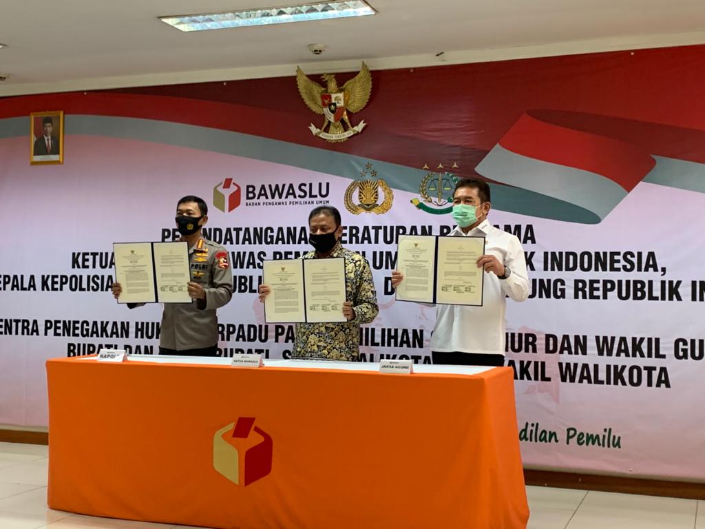 Penandatanganan Peraturan Bersama Tentang Sentra Penegakan Hukum Terpadu Pemilihan Gubernur dan Wakil Gubernur, Bupati dan Wakil Bupati serta Walikota dan Wakil Walikota