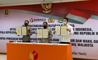 Penandatanganan Peraturan Bersama Tentang Sentra Penegakan Hukum Terpadu Pemilihan Gubernur dan Wakil Gubernur, Bupati dan Wakil Bupati serta Walikota dan Wakil Walikota